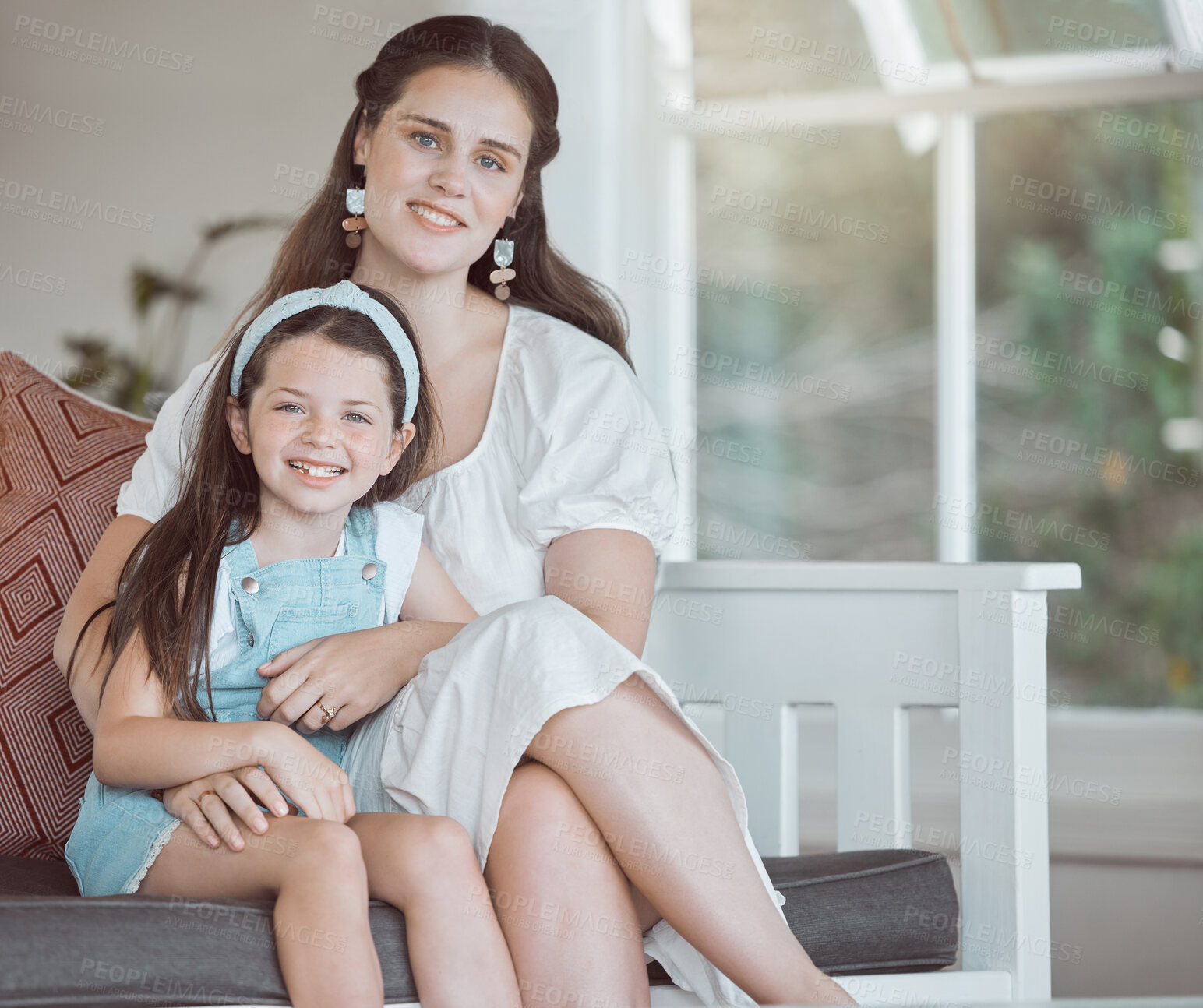 Buy stock photo Happy, mom and child in home for portrait, comfort and support on weekend in Canada, Smile, mother and daughter in living room with hug, relax and bonding with care and security in family with love