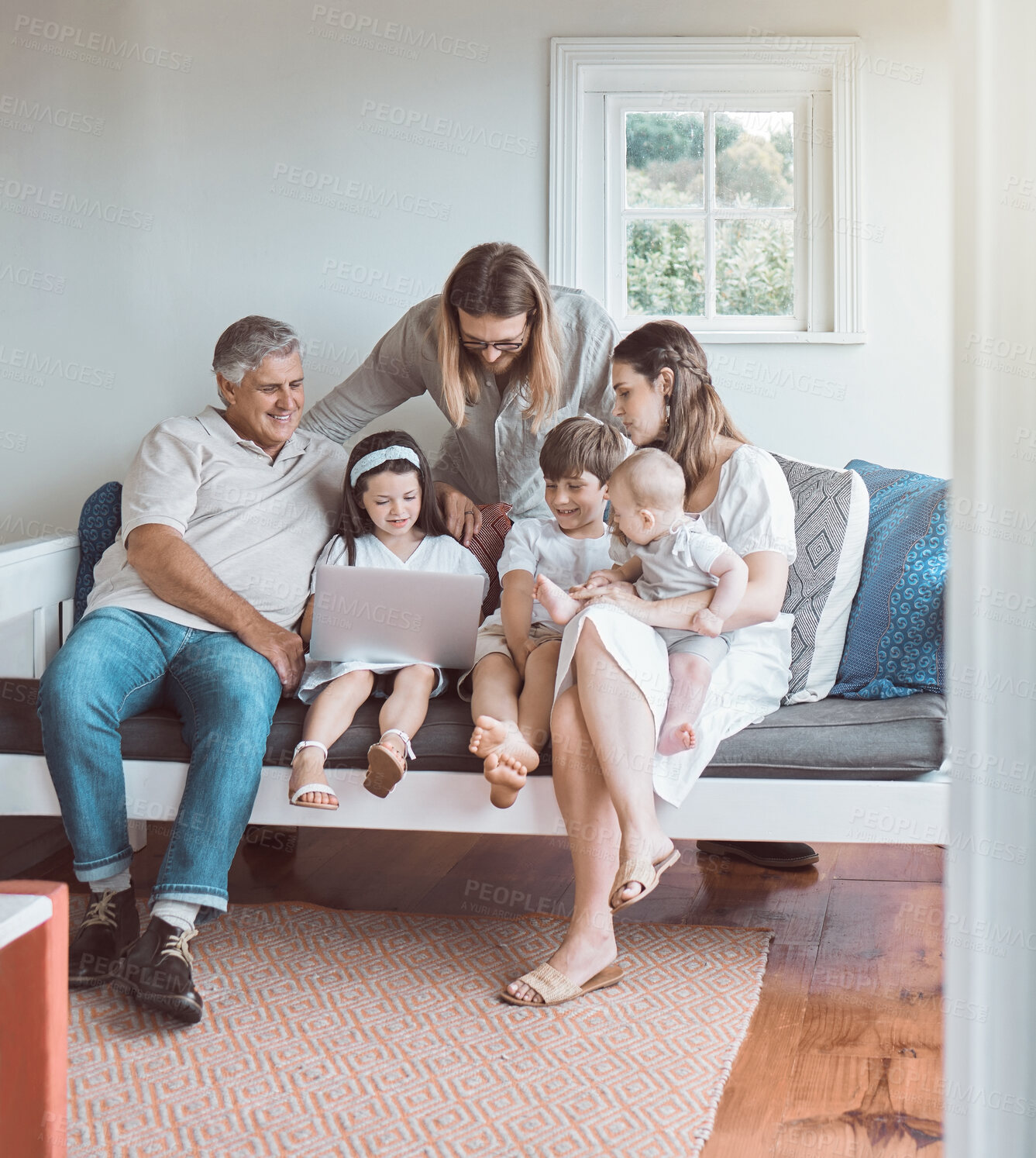 Buy stock photo Happy family, laptop and bonding in home with children, streaming or watching film on weekend in house. People, kids and lounge for connection, together and relax with grandpa, playful and cheerful