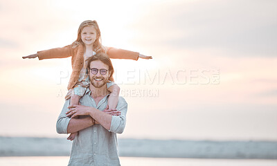 Buy stock photo Shot of a man spending and his daughter spending time together at the beach