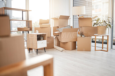 Buy stock photo Moving, new home and cardboard boxes for packing house with furniture, living room decorations and apartment space. Household, packed box and empty property to rent, buy or own with modern interior