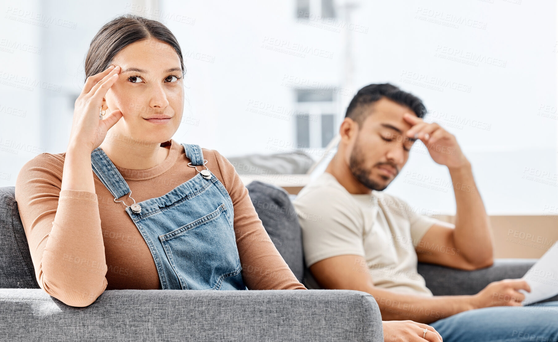 Buy stock photo Argument, angry and couple on sofa for divorce with affair, cheating or conflict in marriage. Upset, break up and frustrated man and woman fighting with relationship fail in living room at home.