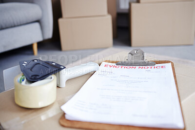 Buy stock photo Home , eviction and notice document for property, finance bankruptcy and legal paperwork or homeowner crisis. Box, vacate apartment and tape dispenser for relocation, overdue payment and tenancy rent