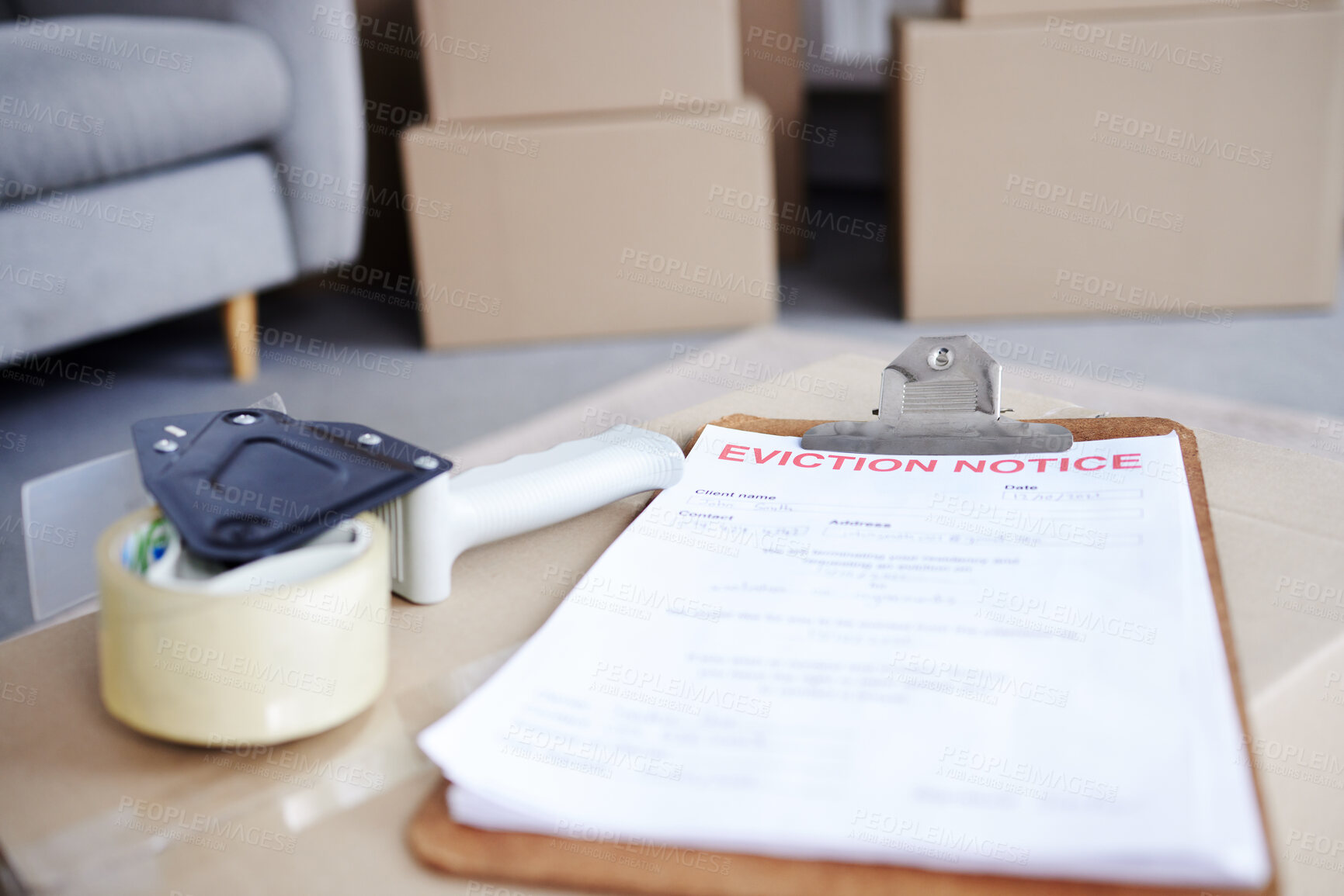 Buy stock photo Home , eviction and notice document for property, finance bankruptcy and legal paperwork or homeowner crisis. Box, vacate apartment and tape dispenser for relocation, overdue payment and tenancy rent