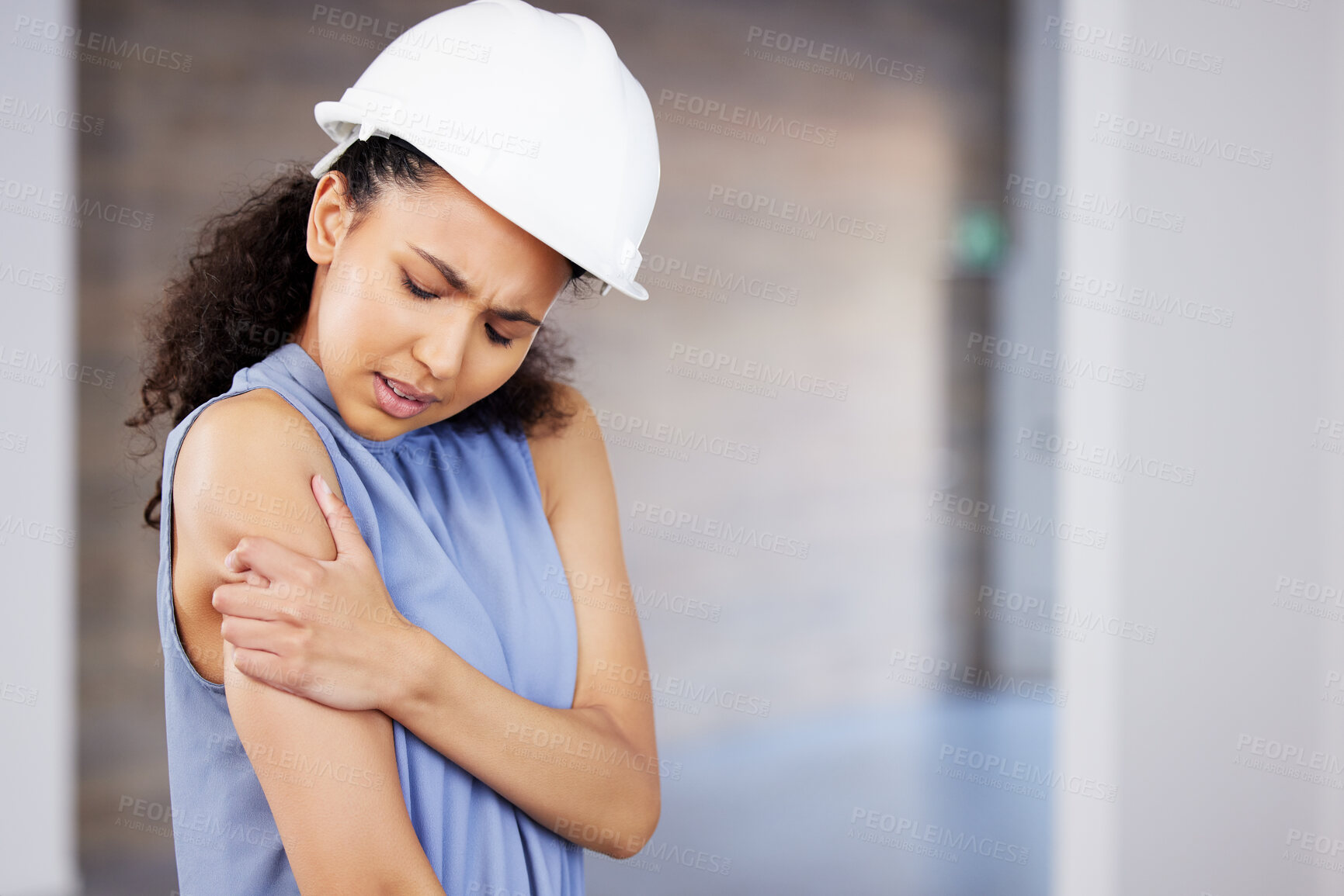 Buy stock photo Engineer, person and shoulder injury, pain or muscle tension after accident at work. Sore arm, inflammation or woman with health problem, arthritis or fibromyalgia at construction site safety hazard