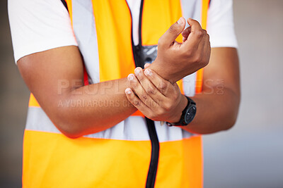 Buy stock photo Accident, building and wrist pain with construction worker person on site for maintenance or repair. Architecture, hands or project management and engineer with emergency, fail or mistake for injury