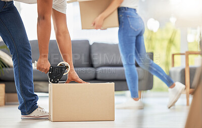 Buy stock photo Hands, people and moving with boxes in house, teamwork for change in rent with real estate. Couple, packing and collaboration in property with mortgage loan, investment in home for future growth