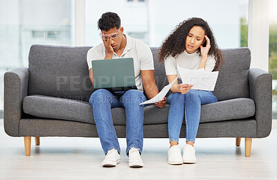 Buy stock photo Couple, paper and stress with laptop on sofa for job search, family planning and manage debt or mortgage application. Man, woman and together on couch in home with documents and tax or bill payments.