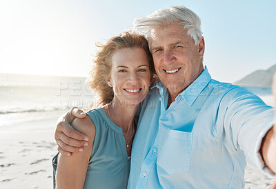 Buy stock photo Senior, couple and selfie at the beach with portrait for happiness on holiday for the weekend. Mature, woman and man hug at the ocean for closeup and smile in the outdoor on vacation for retirement.