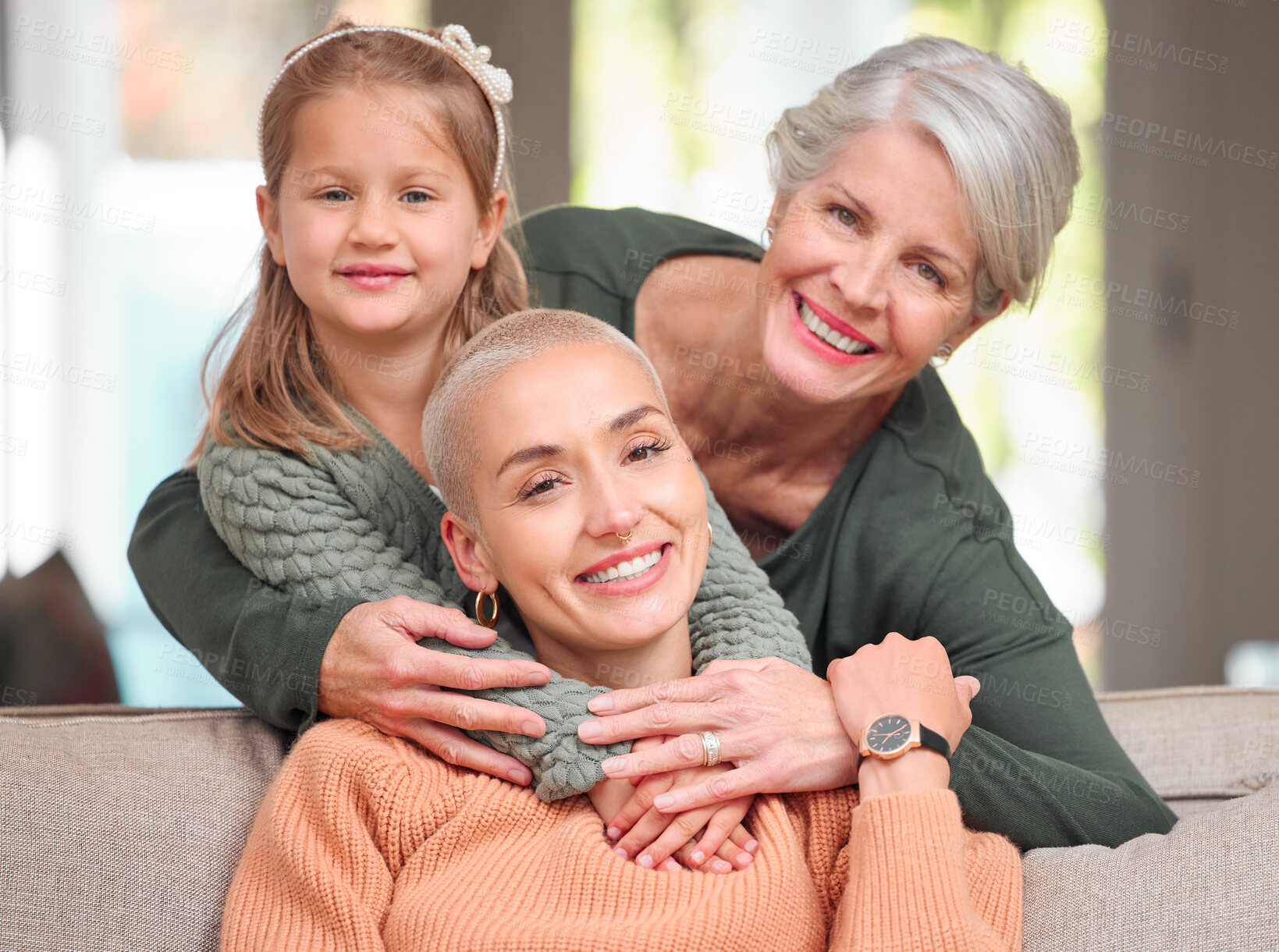 Buy stock photo Women, generations and family with smile on sofa at home for support, care and bonding in Germany. People, mother and grandmother with girl child on portrait in living room for visit, break and relax