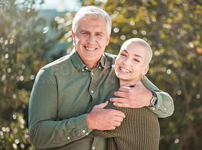 Buy stock photo Cropped portrait of an attractive young woman and her father outdoors