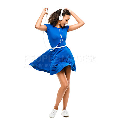 Buy stock photo Girl, teenager and headphones for dancing in studio, listening and energy on white background. Female person, music and streaming audio for fun, online connection and hearing radio for wellness