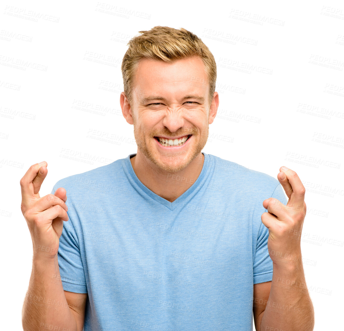 Buy stock photo Wish, fingers crossed and portrait of man in studio for winning, excited or hope for bonus. Emoji, luck and isolated person with hand sign for competition, good news and promotion on white background