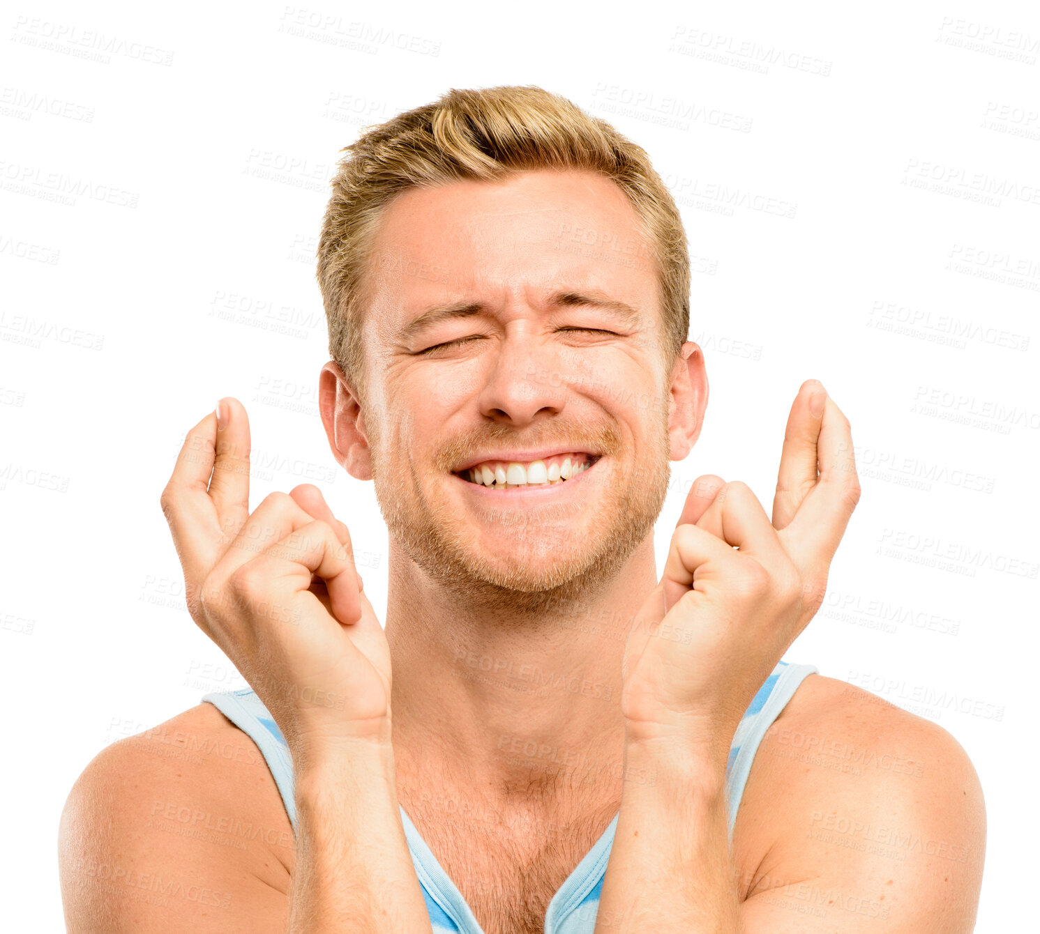 Buy stock photo Wish, fingers crossed and face of man in studio for winning, excited or hope for bonus. Emoji, luck and isolated person with hand sign for competition, good news and promotion on white background