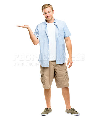 Buy stock photo Showing, pointing and portrait of man on a white background for promotion, news and announcement. Advertising, happy and isolated person with hand gesture for discount, deal and bargain in studio