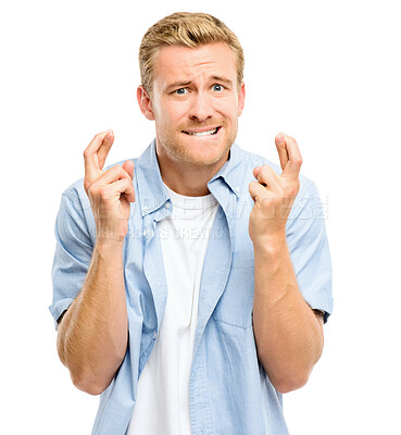 Buy stock photo Hope, fingers crossed and portrait of man in studio for winning, excited or luck for bonus. Emoji, gesture and person with hand sign for competition, good news and promotion on white background