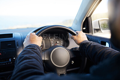 Buy stock photo Shot of a unrecognizable man driving his car