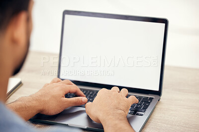 Buy stock photo Shot of an unrecognizable businessperson using a laptop in an office at work