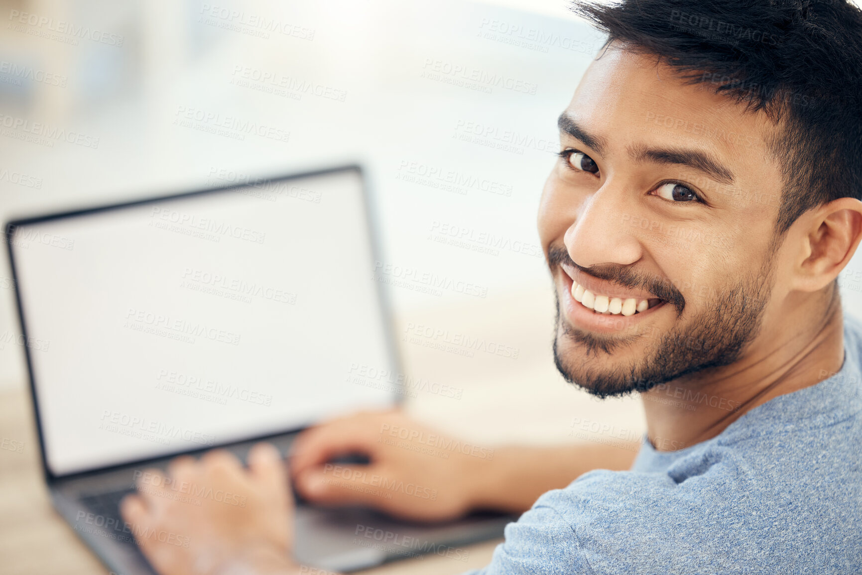 Buy stock photo Mockup, laptop screen and portrait of man in house with creative research for copywriting project. Smile, internet and Asian freelance journalist with blank computer for online article at home.