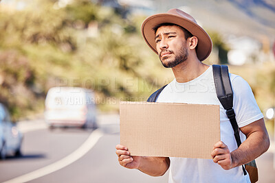 Buy stock photo Asian man, road and signboard for hitchhiking on journey, trip and travel for holiday in California. Male person, backpack and desperate for transport or ride on vacation as tourist with mockup space