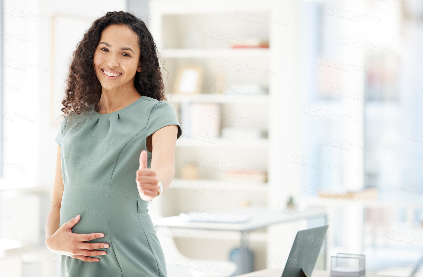 Buy stock photo Portrait, thumbs up and a pregnant business woman in her office getting ready for maternity leave from work. Happy, mother or support with a young female employee holding her stomach in the workplace