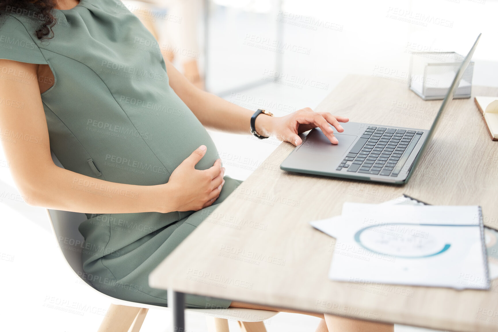 Buy stock photo Laptop, documents and pregnant business woman in office for finance investment report online. Computer, pregnancy and female financial advisor working on company budget plan for maternity leave.