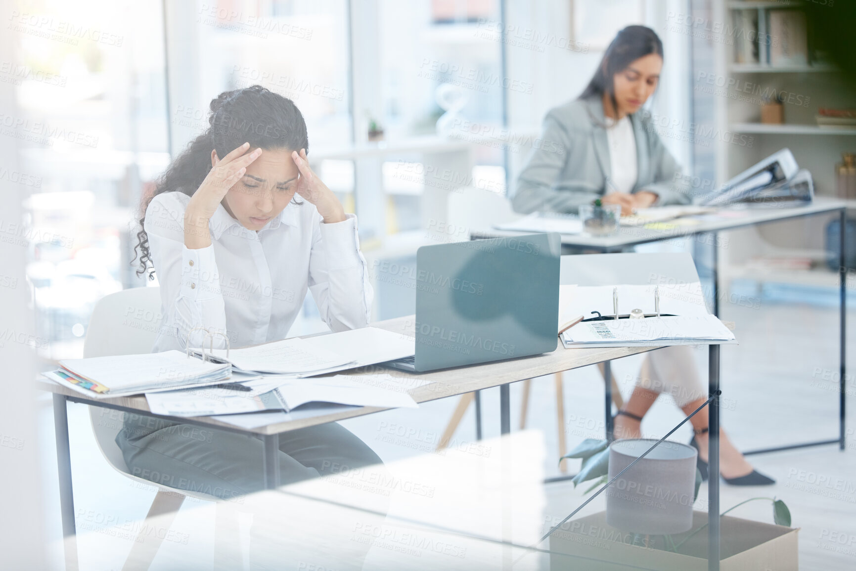 Buy stock photo Headache, woman and stress in office for finance, company debt and overwhelmed in business. Female administrator, frustrated and anxiety at desk for budget crisis, burnout or confusion with documents