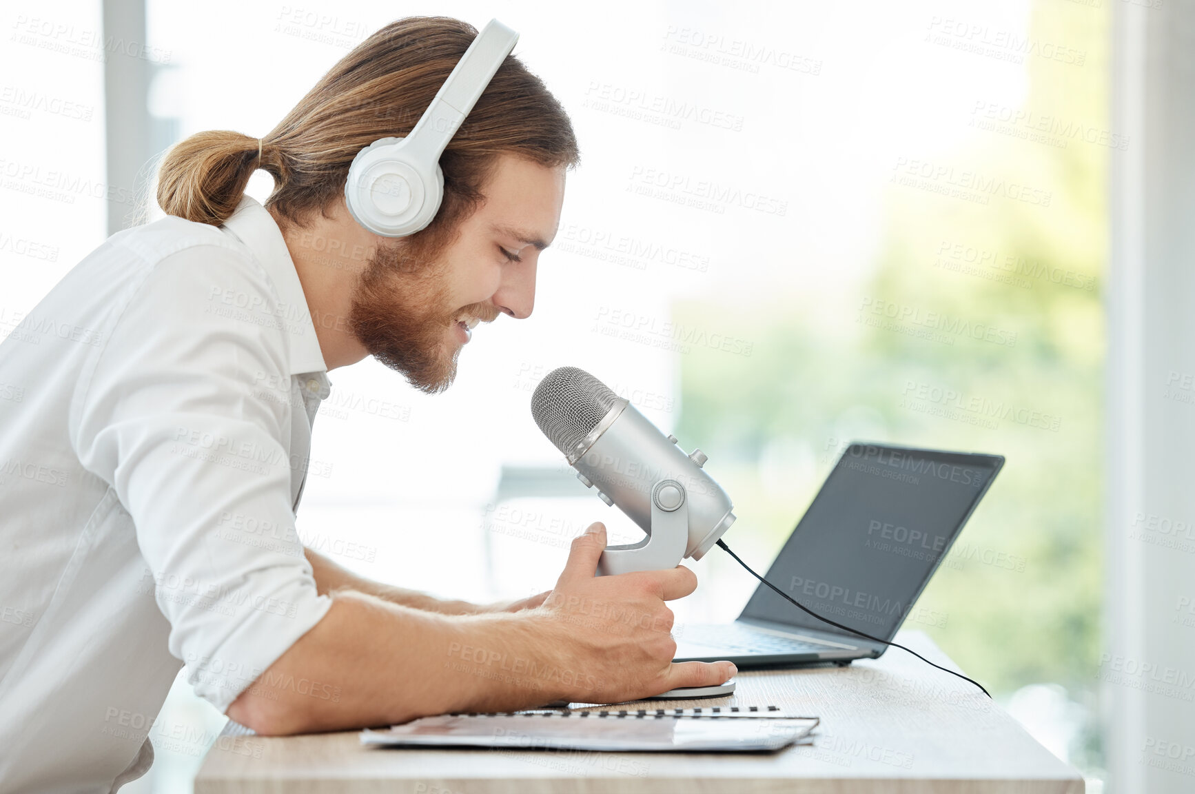 Buy stock photo Man, office and microphone for podcast or broadcast for business advice as content creator. Male person, hosting and presenter with online talk show for communication, networking and live streaming