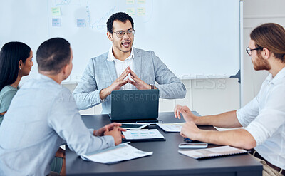 Buy stock photo Shot of a group of businesspeople having a business meeting in a boardroom