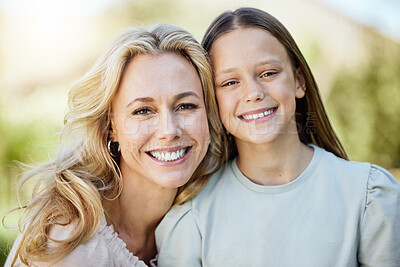 Buy stock photo Shot of a woman spending time outdoors with her young daughter