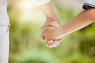 Buy stock photo Holding hands, bonding and family in park, walking and parent with child, outdoor and trust with love. Nature, person and together with kid, break and dad with affection, garden and care in weekend