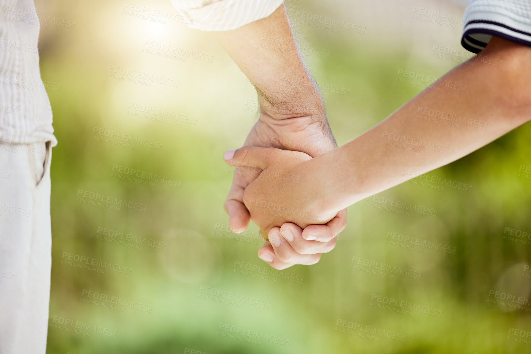 Buy stock photo Holding hands, bonding and family in park, walking and parent with child, outdoor and trust with love. Nature, person and together with kid, break and dad with affection, garden and care in weekend