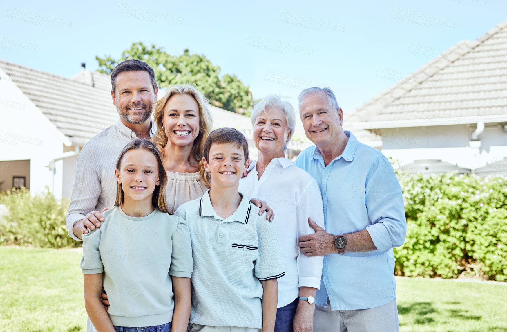 Buy stock photo Portrait, happy big family and outdoor by home together for support, bonding or love. Face, mother and father with children, grandparents and generations of people with siblings at backyard of house