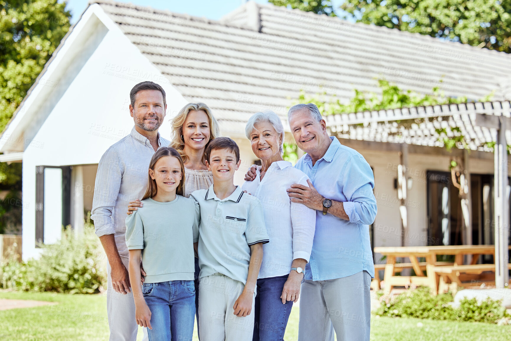 Buy stock photo Portrait, happy big family and outdoor by house together for support, bonding or love. Smile, mother and father with children, grandparents and generations of people with siblings in backyard of home