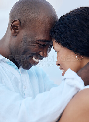 Buy stock photo Black couple, smile and forehead touch at beach for care, trust and love on date together. Happy man, woman and romance outdoor for connection, loyalty and commitment on summer holiday or vacation