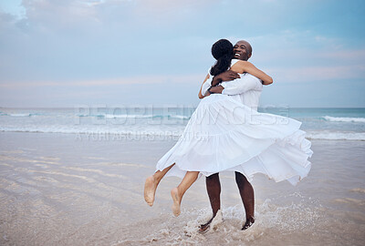 Buy stock photo Hug, honeymoon and black couple playing at beach for love, trust or travel together on date. Smile, sea or happy people romantic anniversary for holiday, loyalty or marriage commitment in Mauritius