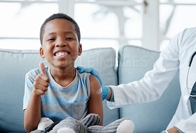 Buy stock photo Boy kid, thumbs up and injection with smile in portrait, plaster and medicine for wellness in hospital. Male child, happy and excited with vaccine, healthcare and brave to stop virus on clinic sofa