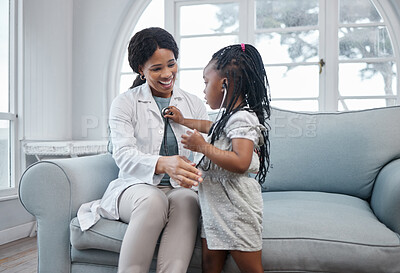 Buy stock photo Doctor, girl and pediatrician woman with stethoscope, medical test and appointment with child on sofa. Healthcare, cardiology and kid listen to heart, breathing and lung health in living room