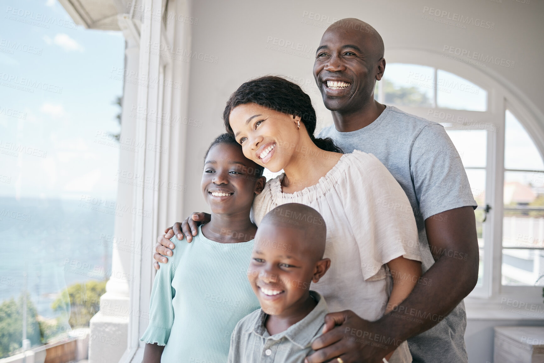 Buy stock photo Happy, bonding and black family by window in home for view, connection or reflection. Smile, thinking and African children with mother and father in house accommodation for vacation or weekend trip.