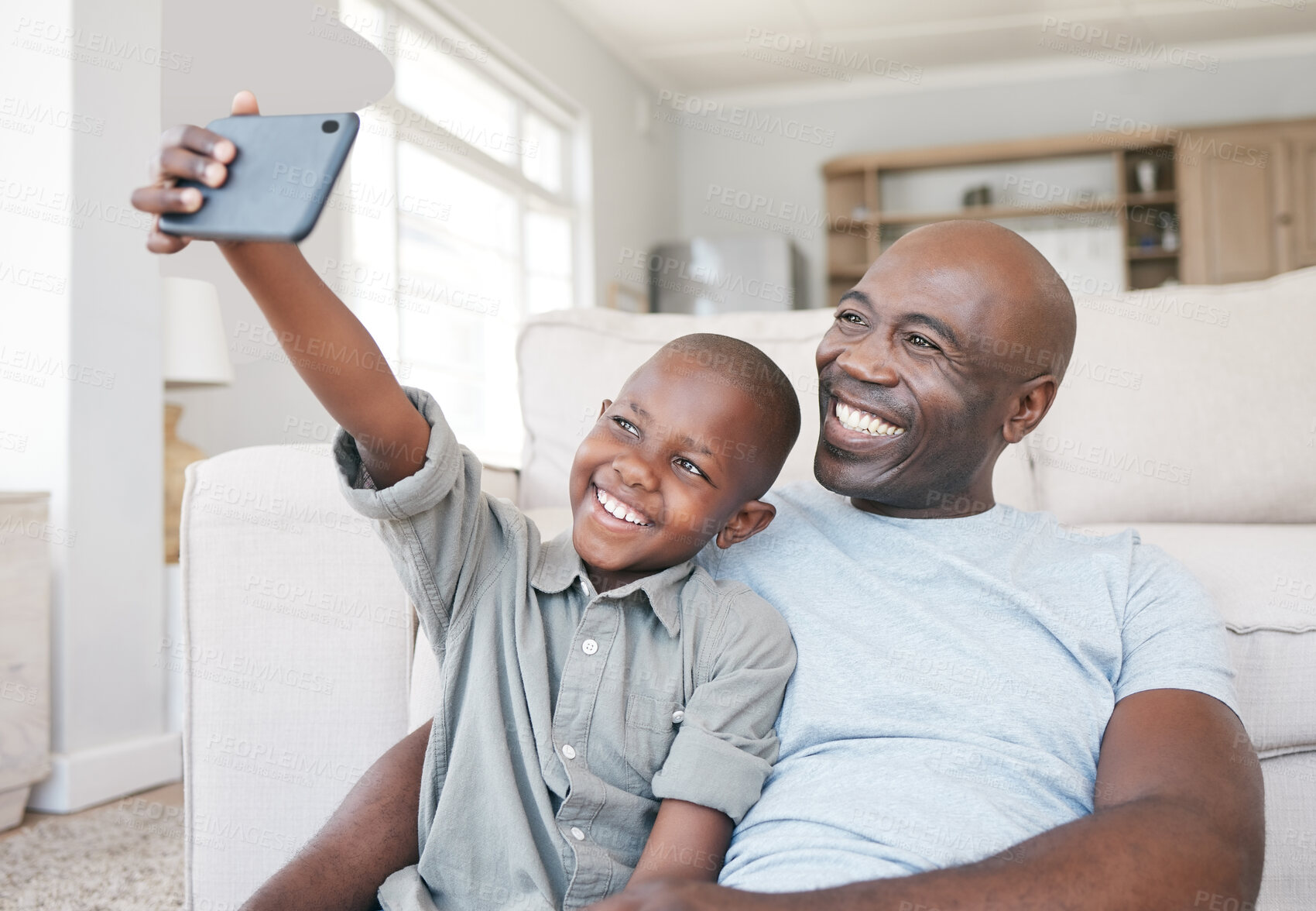 Buy stock photo Black people, dad and happy with boy on selfie at home on floor for social media, memories and profile picture. Family, parent and smile with kid in living room for bonding, support and childcare