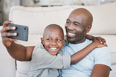 Buy stock photo Black people, dad and happy with son on selfie at home on floor for social media, memories and profile picture. Family, parent and smile with kid in living room for bonding, support and childcare