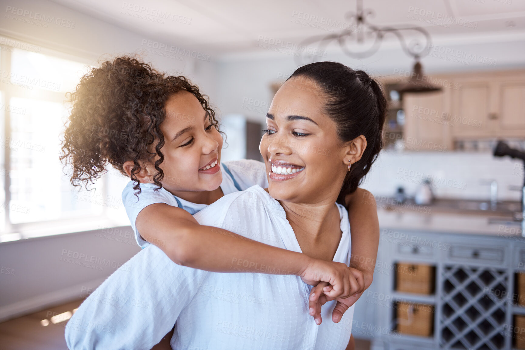 Buy stock photo Shot of a little girl bonding with her mother at home