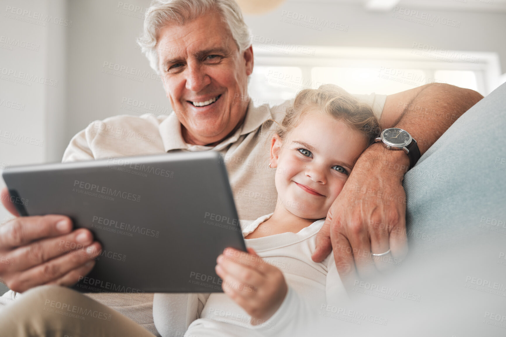 Buy stock photo Portrait, sofa and grandfather with child on tablet for watching videos, online cartoons and streaming movies. Family, home and grandpa with girl on digital tech for bonding, relationship and relax