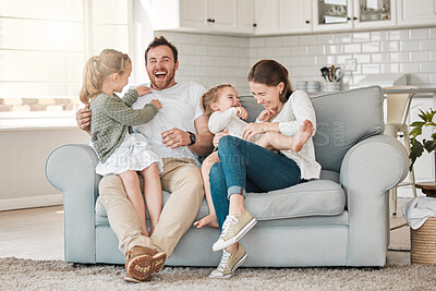 Buy stock photo Family, playful and laughing in house for relax, care and happiness on sofa with joy, embrace and fun. Parents, face and people with children for love, bonding and support together in lounge on couch