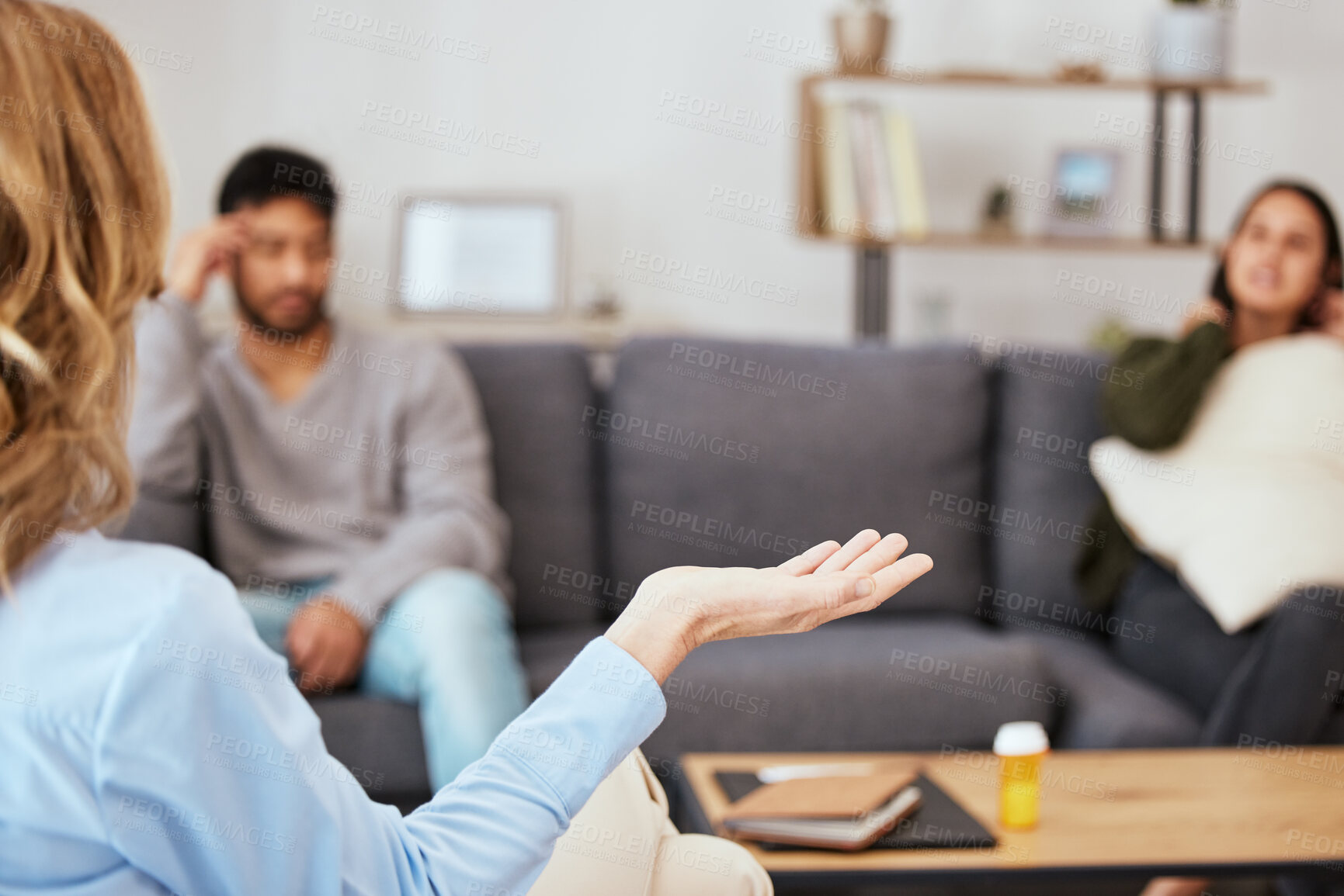 Buy stock photo Shot of a couple having an argument during a counseling session with a therapist