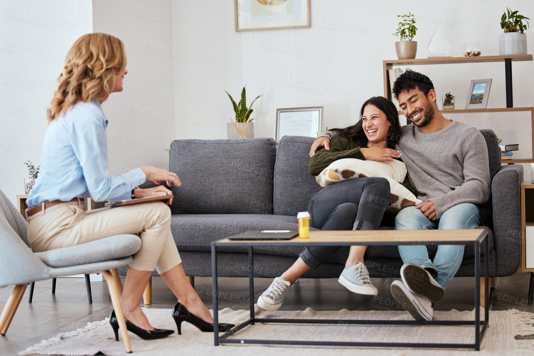 Buy stock photo Shot of a happy couple at a therapy session