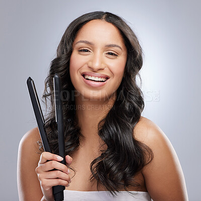 Buy stock photo Girl, portrait and flat iron in studio for hair grooming or styling, haircare and beauty routine for wellness or keratin treatment. Woman, tool and isolated on white background for result and shine.