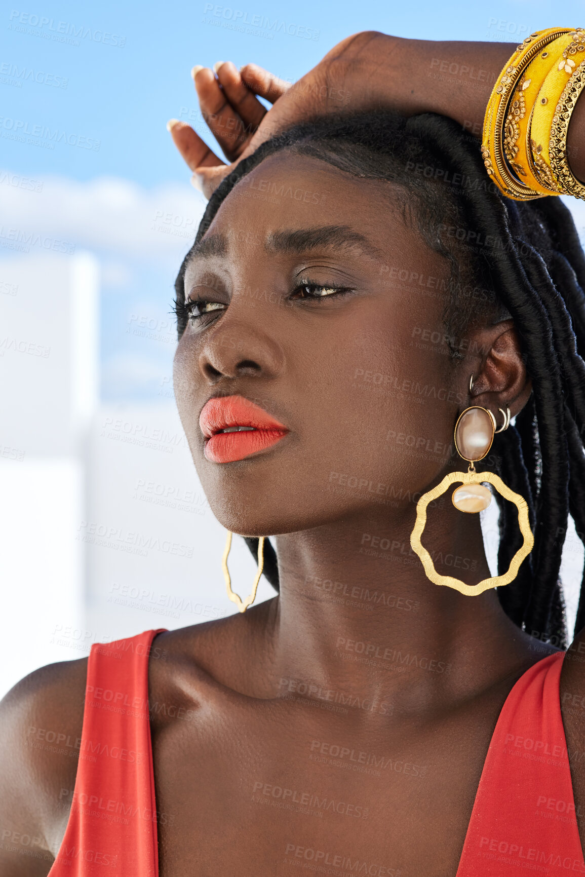 Buy stock photo Cropped shot of an attractive young woman posing on a rooftop outdoors