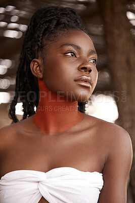 Buy stock photo Shot of a beautiful young traditional woman posing outside