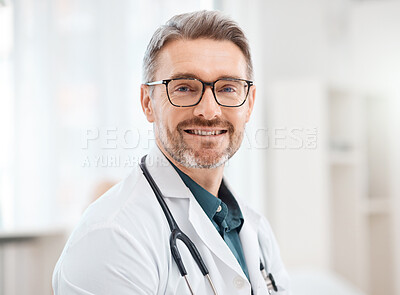 Buy stock photo Portrait of a mature doctor working in a clinic