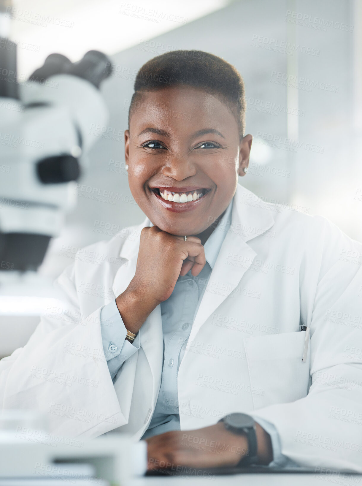 Buy stock photo Portrait of a young woman working in a lab